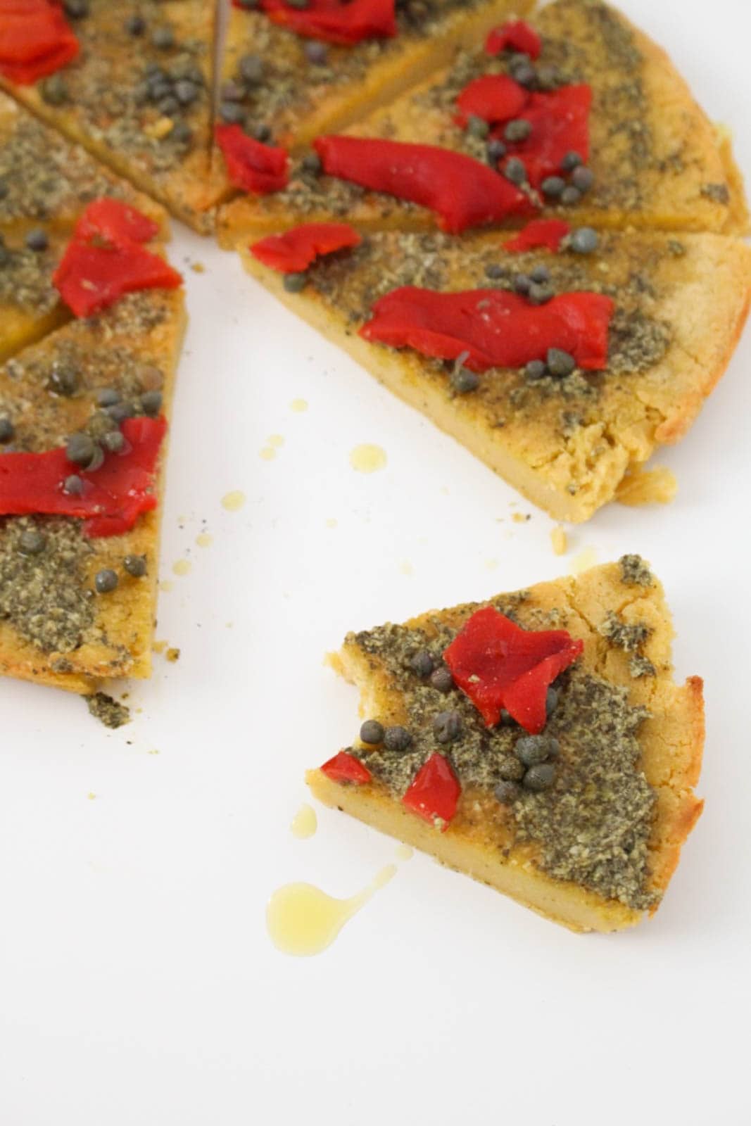 Socca Flatbread with Pesto, Red Peppers & Capers