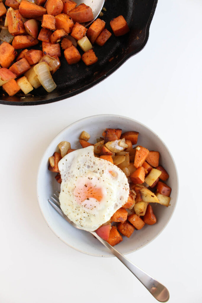 Caramelized Apple, Onion & Sweet Potato Hash Recipe with fried egg