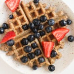 Waffles with blueberries and strawberries.